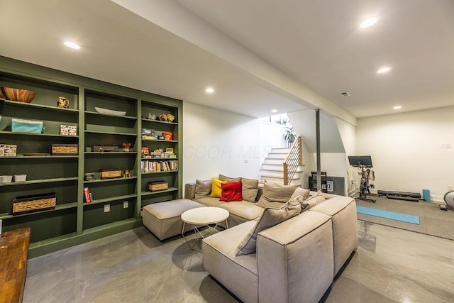 living room with concrete floors