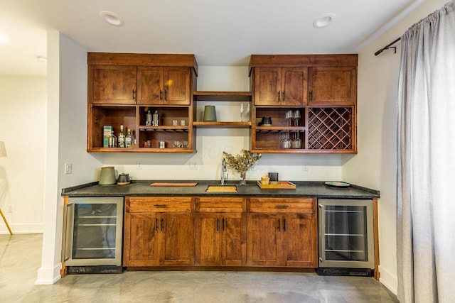 bar with wine cooler and sink