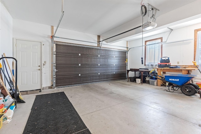 garage featuring a garage door opener