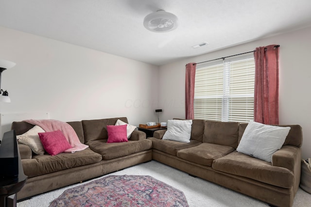 living room featuring light colored carpet