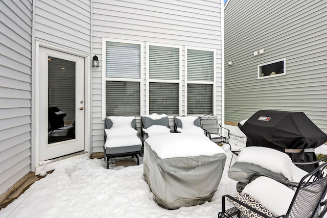 view of snow covered patio