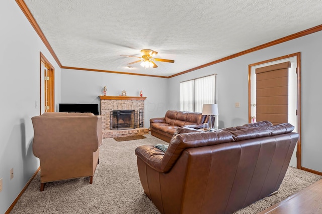 living room featuring a textured ceiling, hardwood / wood-style floors, crown molding, a fireplace, and ceiling fan