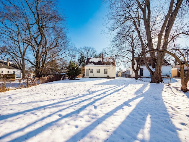 view of yard covered in snow