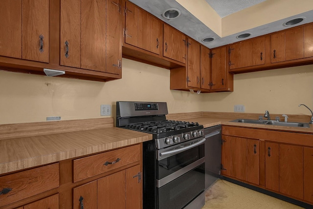 kitchen featuring stainless steel appliances and sink