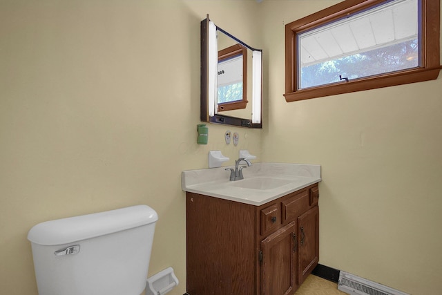 bathroom featuring toilet and vanity