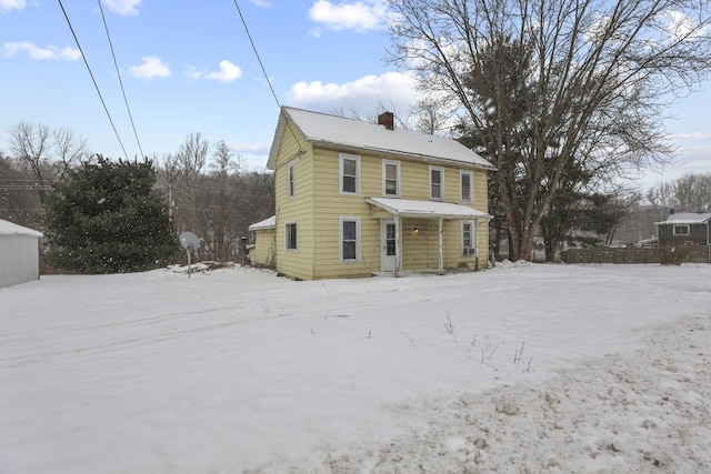 view of snow covered property