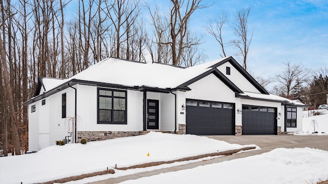 view of front of home with a garage