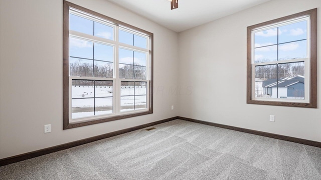 view of carpeted spare room
