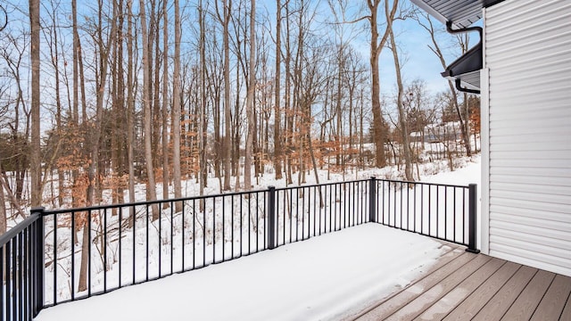view of snow covered deck