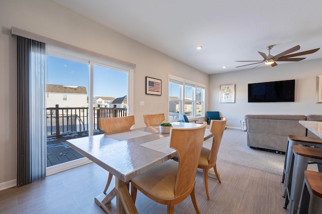 dining space featuring ceiling fan