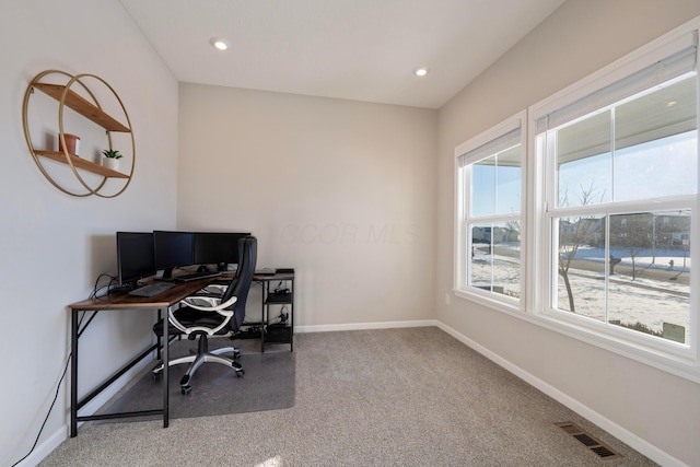 home office with carpet flooring