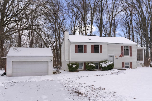 raised ranch featuring a garage