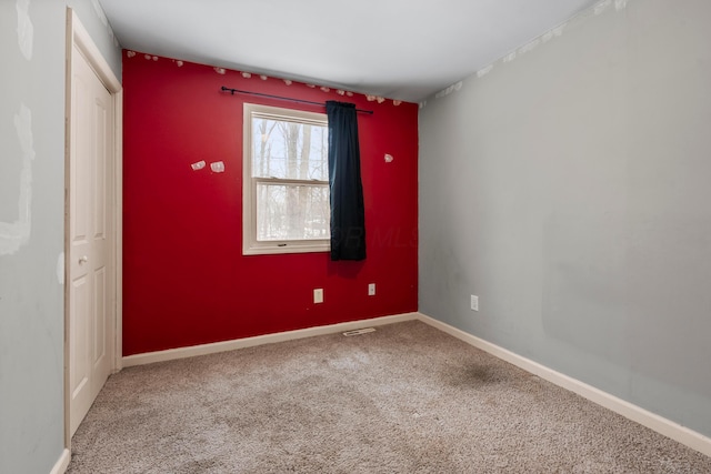 view of carpeted spare room