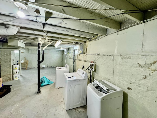 basement with separate washer and dryer