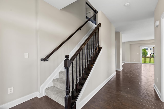 7136 Cabernet Ct, Dublin, OH 43016 - staircase with wood finished floors and baseboards