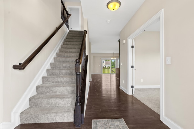 7136 Cabernet Ct, Dublin, OH 43016 - stairway featuring wood finished floors and baseboards