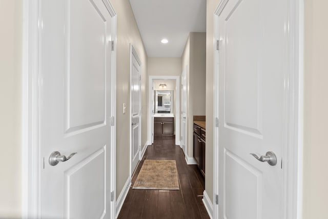 7136 Cabernet Ct, Dublin, OH 43016 - corridor with dark wood-style flooring and recessed lighting