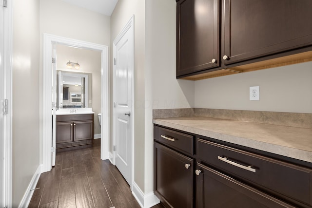 7136 Cabernet Ct, Dublin, OH 43016 - hallway with dark wood-style flooring and baseboards