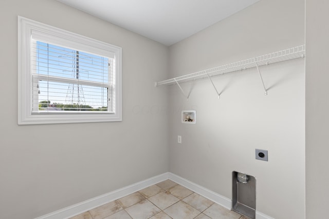 7136 Cabernet Ct, Dublin, OH 43016 - washroom featuring electric dryer hookup, hookup for a washing machine, and light tile patterned flooring