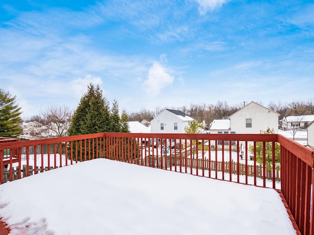 view of snow covered deck