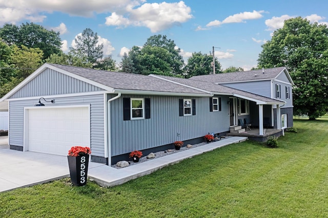 single story home with a front lawn and a garage