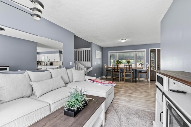 living room with light hardwood / wood-style floors