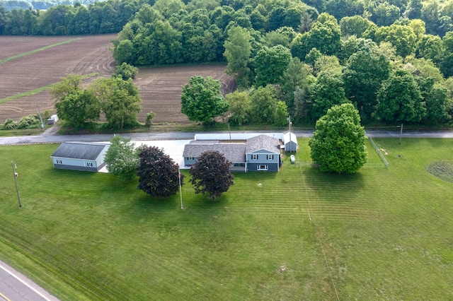 birds eye view of property featuring a rural view