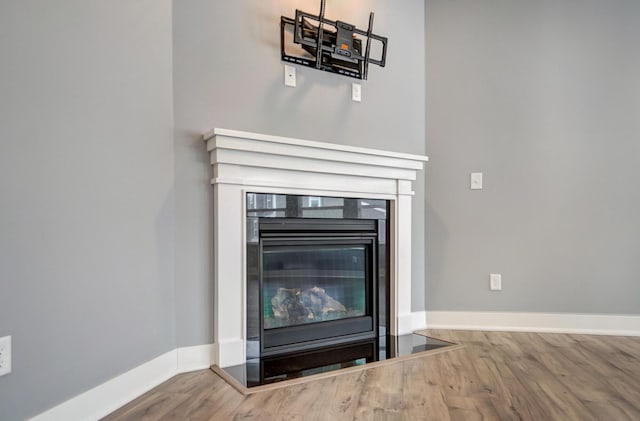 interior details featuring hardwood / wood-style floors