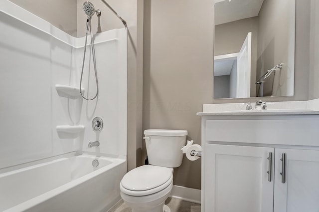 full bathroom with toilet, vanity, and  shower combination