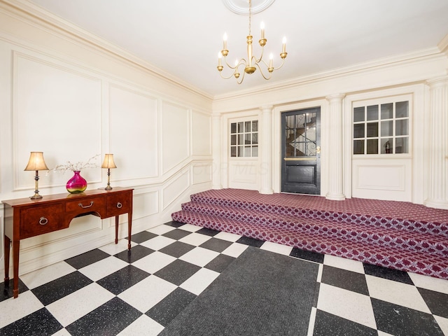 interior space featuring a chandelier and ornamental molding