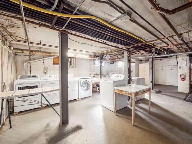 basement featuring separate washer and dryer