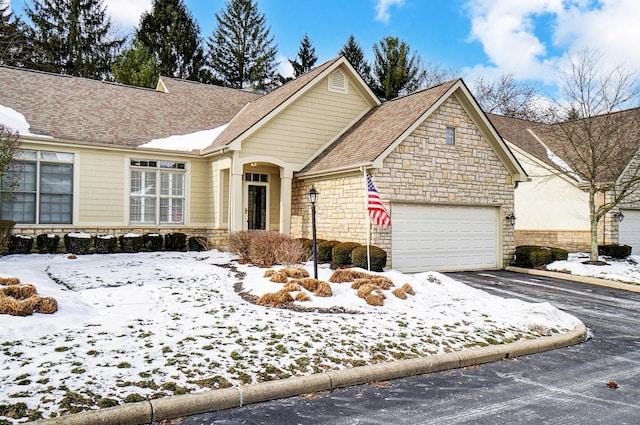 view of front of house with a garage