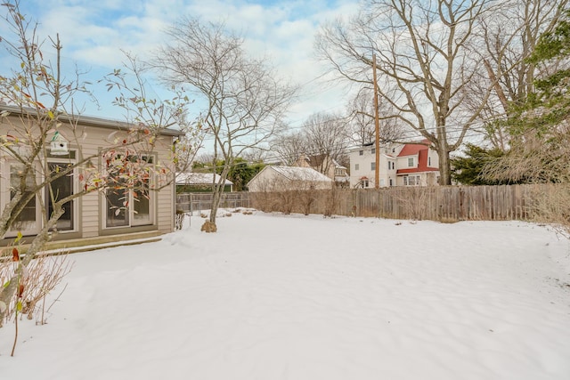 view of yard covered in snow