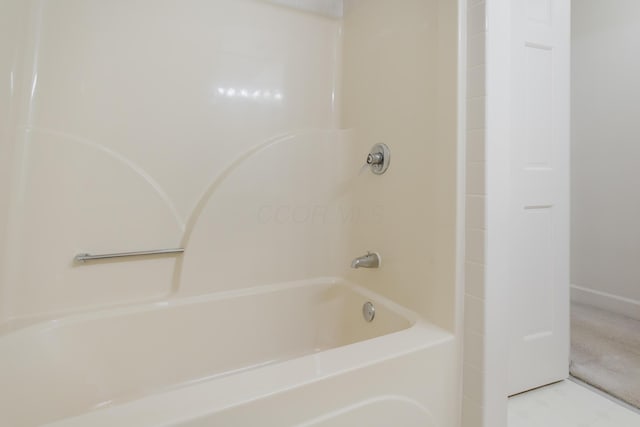 bathroom featuring washtub / shower combination