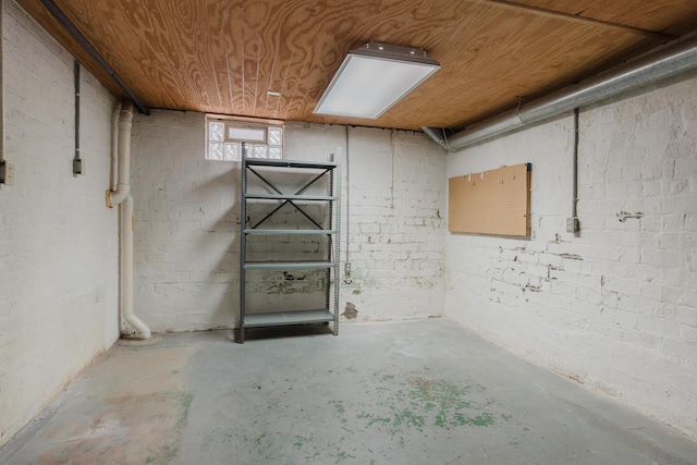 basement with wooden ceiling