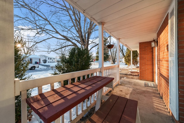 view of snow covered deck