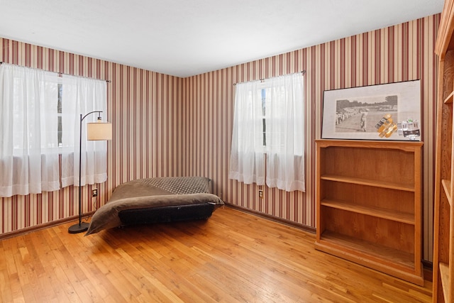 sitting room featuring wood-type flooring