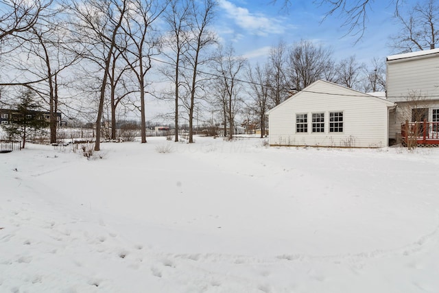 view of yard covered in snow