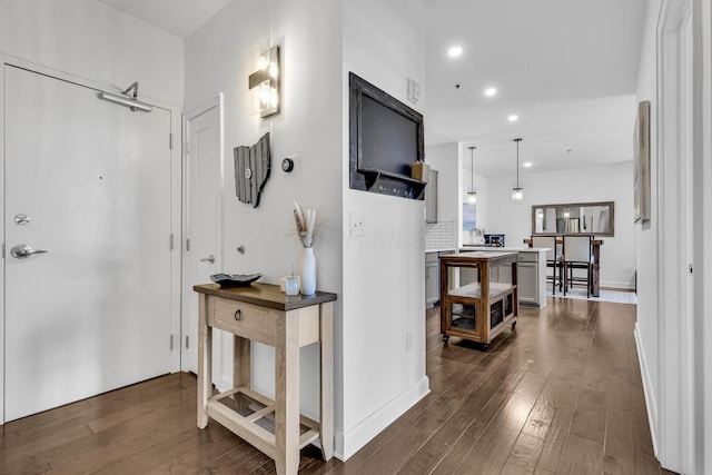 hall featuring dark wood-type flooring