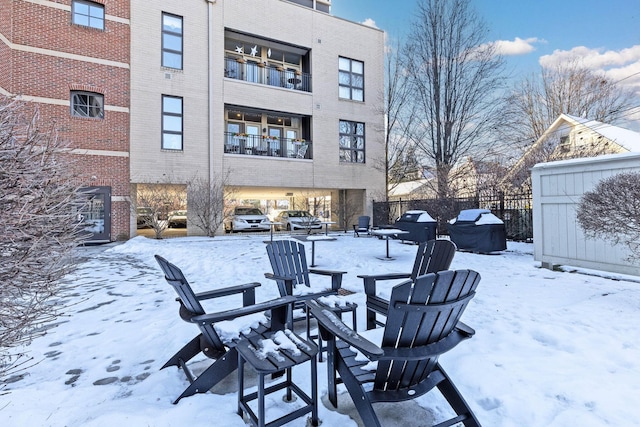 view of snow covered patio