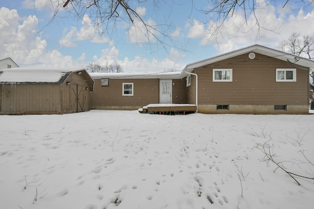 view of snow covered property