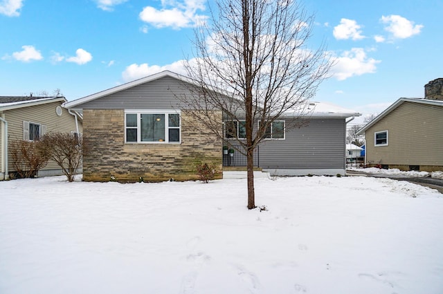 view of snow covered property