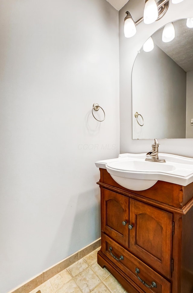 bathroom featuring vanity and tile patterned floors