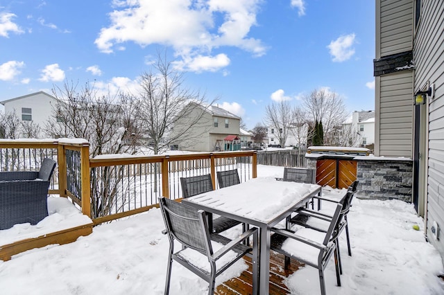 view of snow covered deck