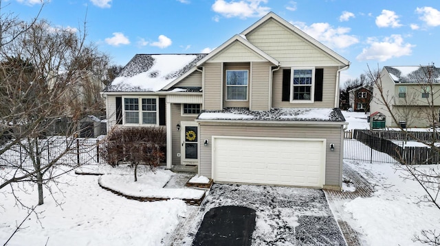 view of front of property featuring a garage