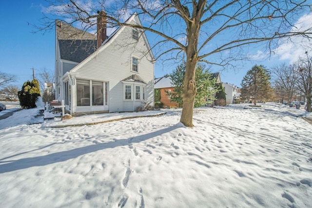 view of snow covered property