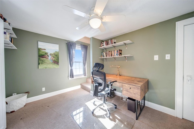 home office with ceiling fan and carpet