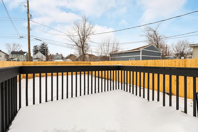 view of snow covered deck