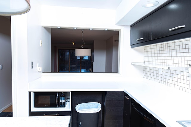 bathroom featuring tasteful backsplash