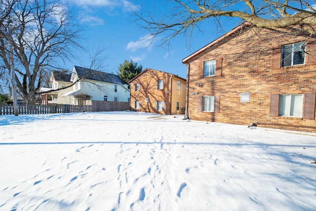 view of snow covered house